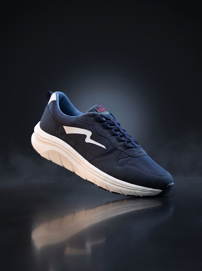 Caldri Navy Blue Vegan Leather Casual Sneakers For Men - three quarter view