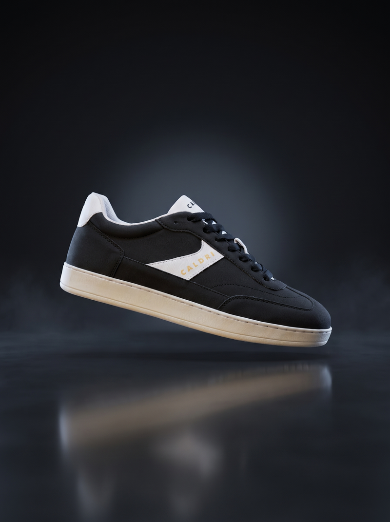 Caldri Black Vegan Leather Casual Sneakers For Men - three quarter view