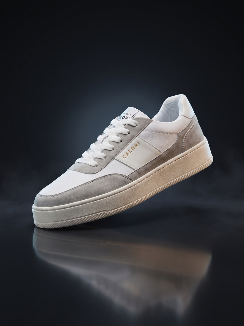 Caldri White Vegan Leather Casual Sneakers For Men - three quarter view