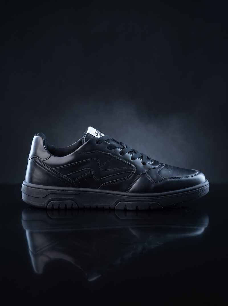 Caldri Ravin All Black Genuine Leather Casual Sneakers For Men - three quarter view