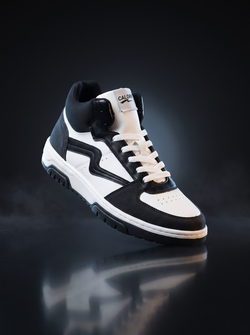Caldri Ravin High Ride Black White Genuine Leather Mid-Top Sneakers For Men - three quarter view