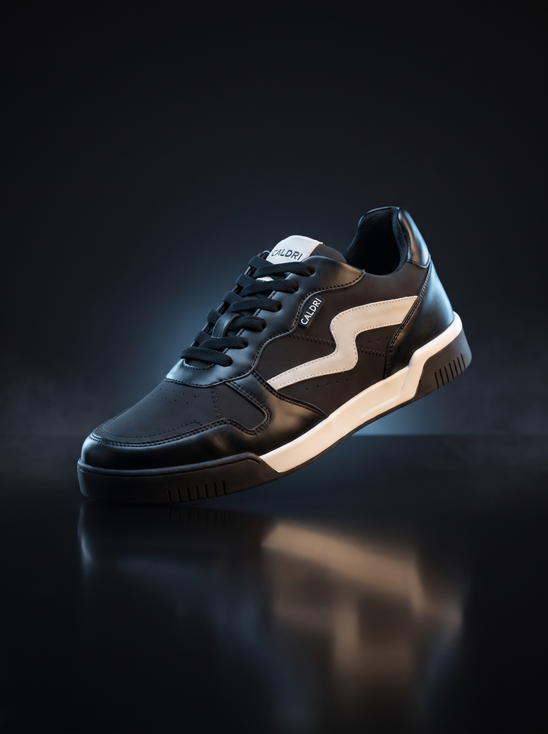 Caldri Panther Black White Genuine Leather Casual Sneakers For Men - three quarter view